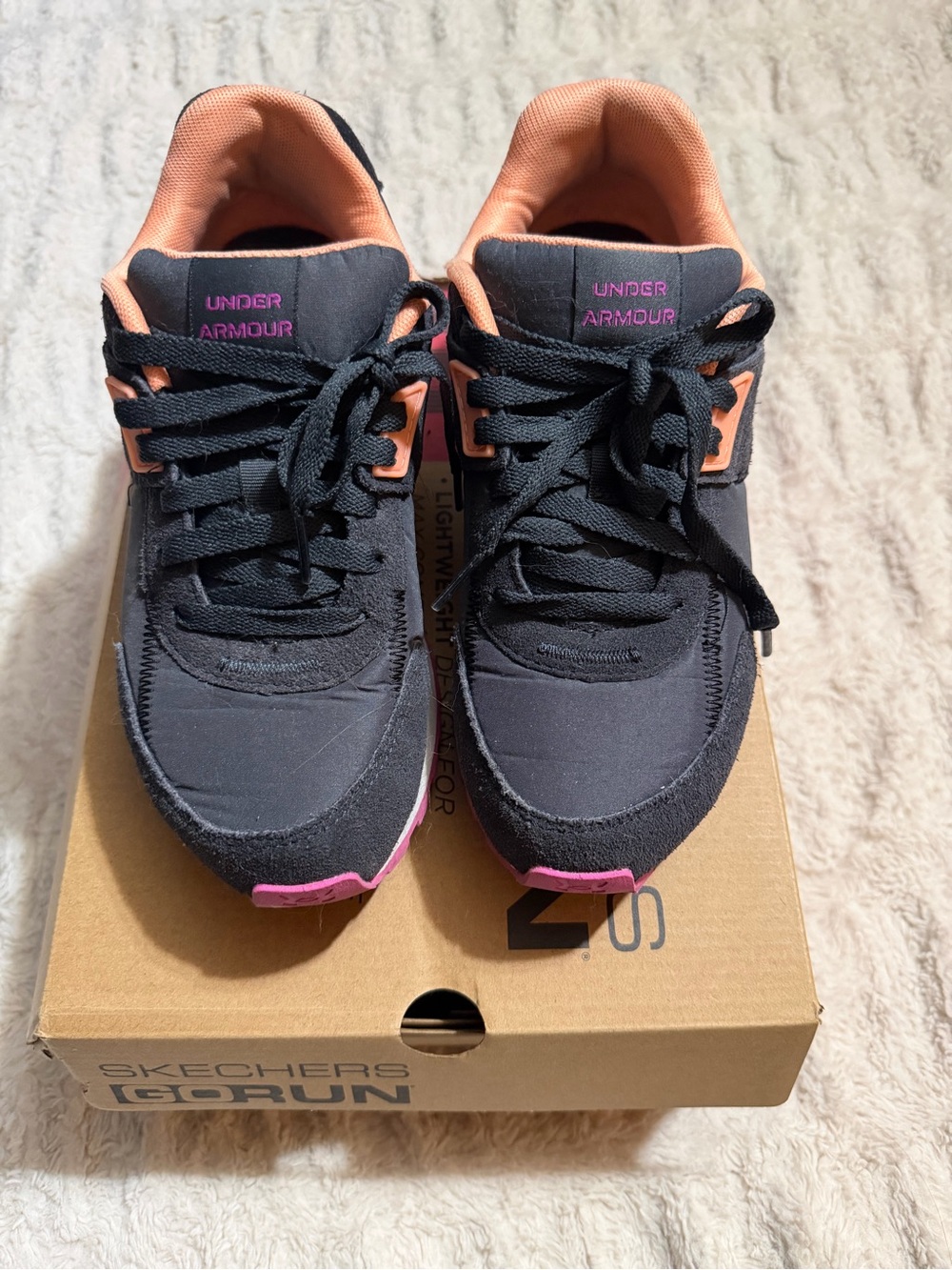 Under Armour Women's Black Athletic Sneakers with Peach and Pink Accents